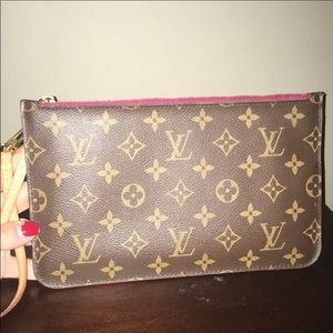 100% Auth Louis Vuitton neverfull wristlet.